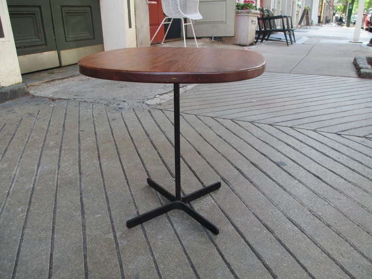 American Walnut and wrought iron side table in the style of Alan Gould 