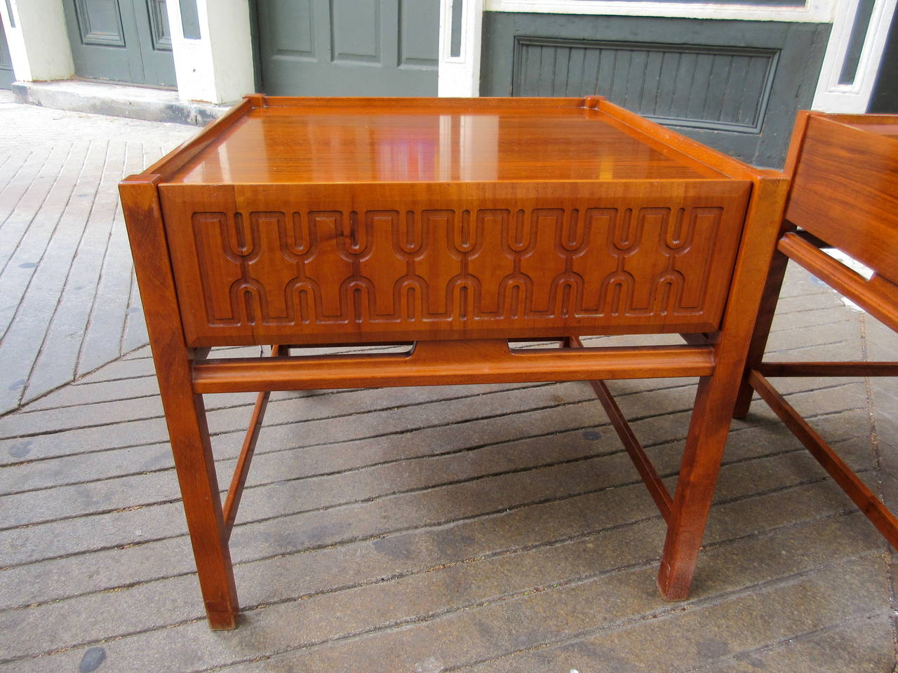 Very nice pair of Swedish nightstands, each with one drawer. Tops of each table have a lip that surrounds top. Fronts of each drawer is carved. Stretchers to legs on three sides.