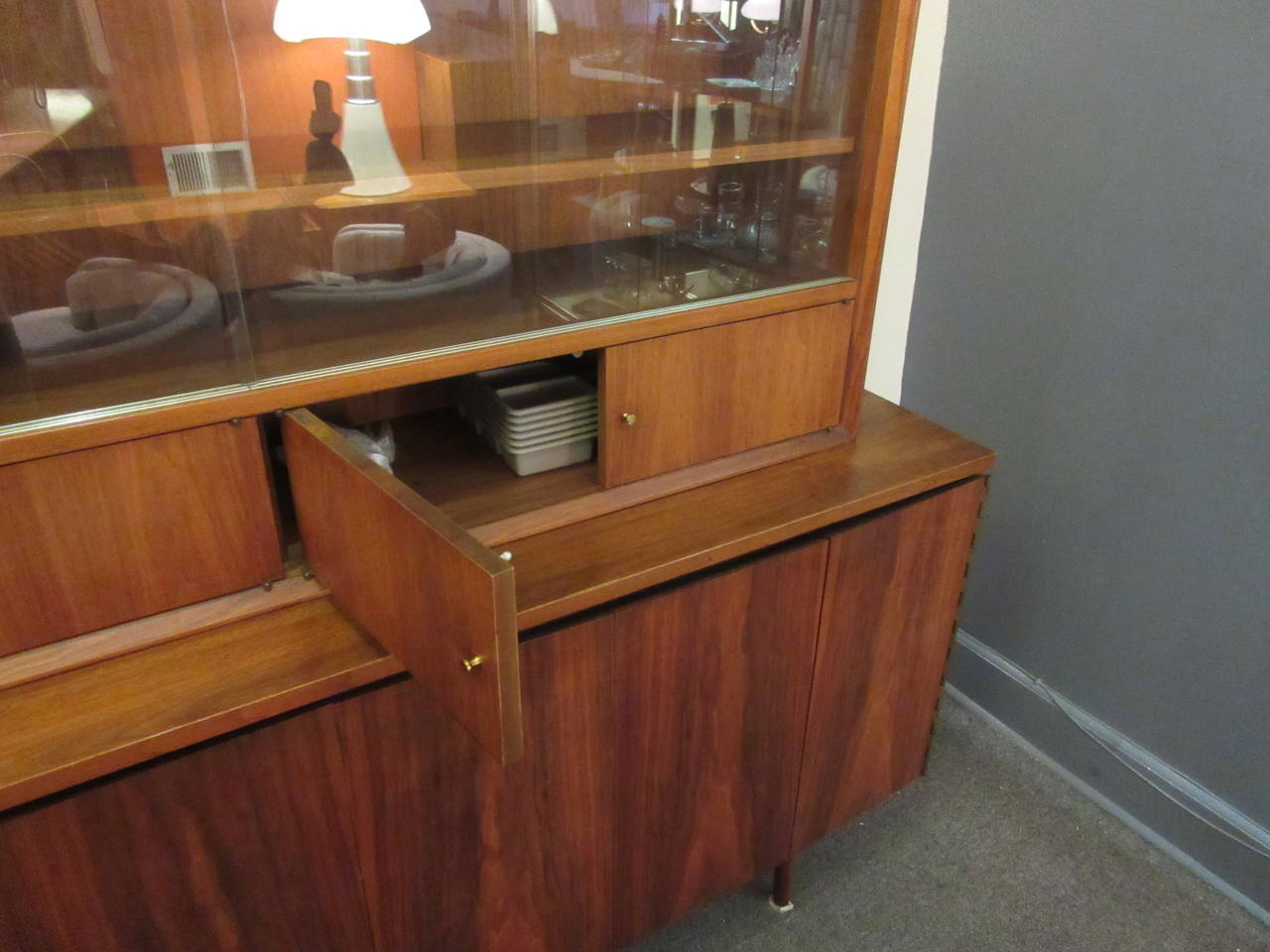 McCobb walnut credenza, buffet or dresser very versatile piece that can be used with or without top display cabinet. Also very easy to install marble or stone top, this series was sold with marble or wood tops. A few screws allow for easy