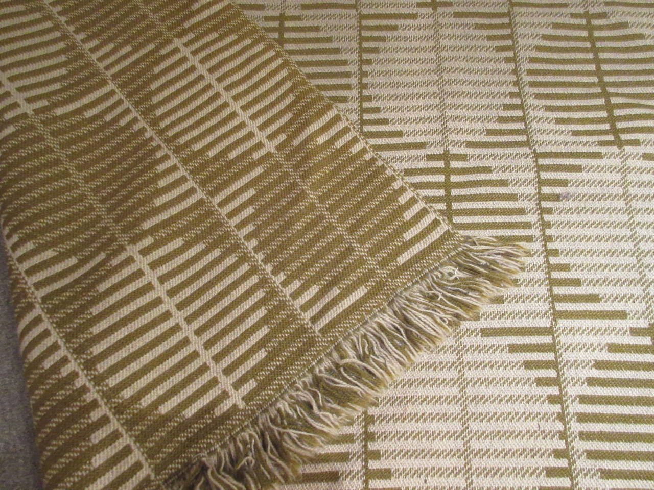 Reversible rug of off-white, greige and olive coloring. Just cleaned and perfect.