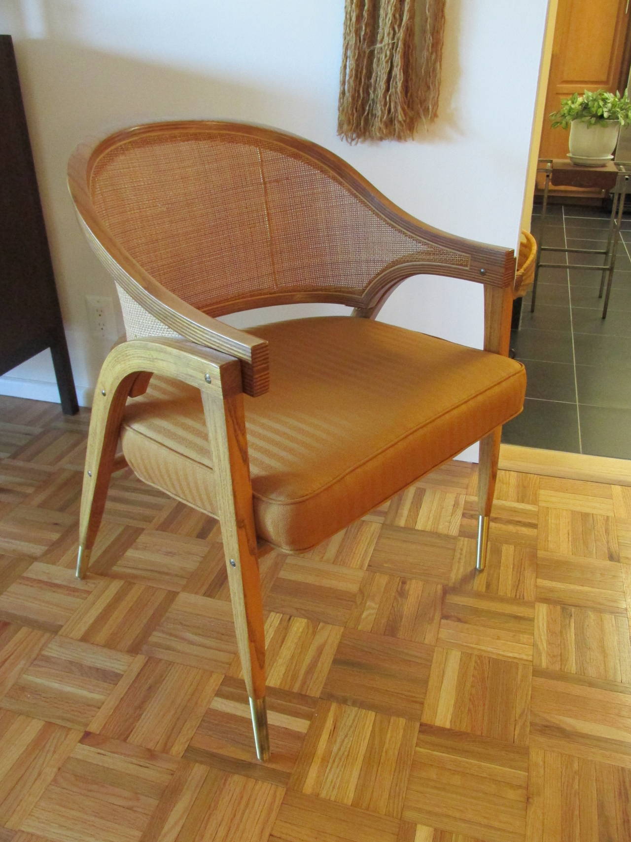 Bent oak plywood, cane and upholstered chairs in perfect original condition bought from original owner. Purchased in 1954 these chairs have been treasured. The current fabric is older but not original and in excellent condition. Dunbar catalogue