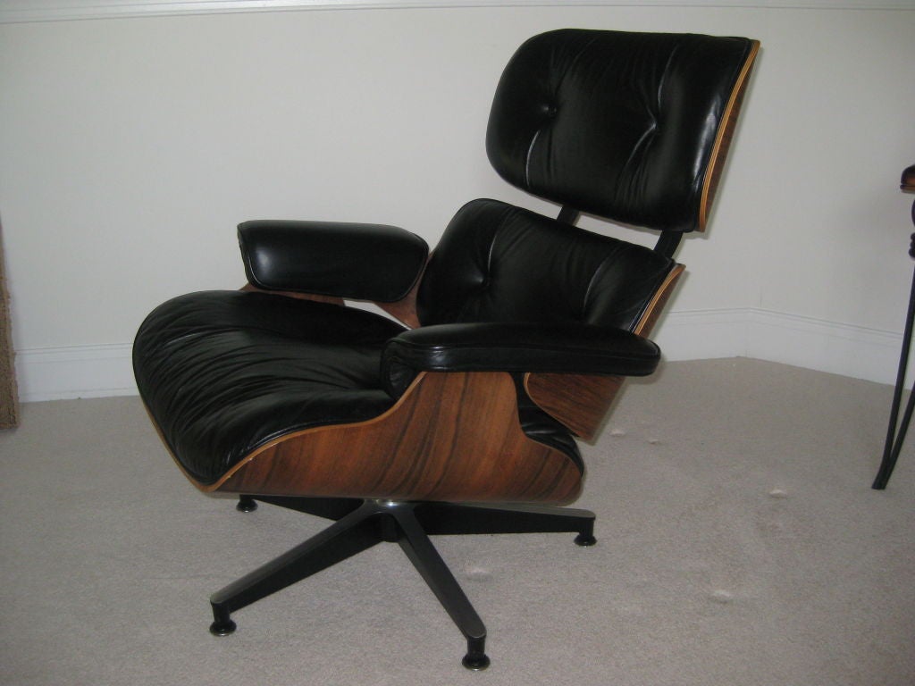 Fauteuil de salon Charles Eames en bois de rose 670