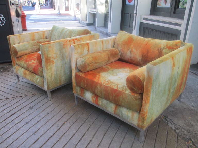 Comfortable aluminum based club chairs in outrageous original Jack Lenor Larson fabric with additional bolsters