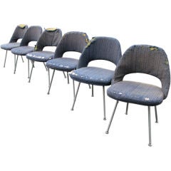 Set of six Eero Saarinen side chairs on steel legs