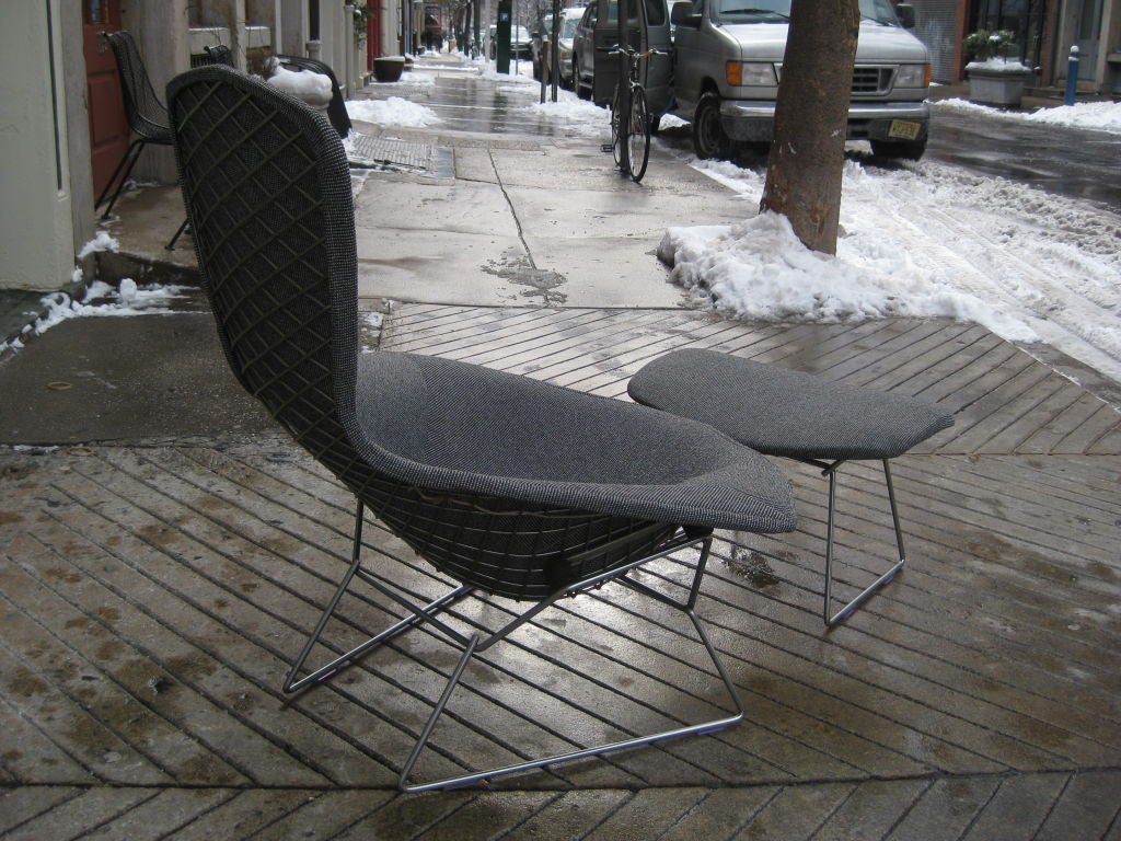 Sculpted and welded chrome mesh chair and ottoman, sleigh runner supports.  This is an older 1960's version of this chair