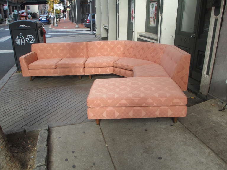 Three piece sectional sofa by Harvey Probber.  Large piece is armless with two 45 degree angles dividing the piece in three equal sections.   The second piece is a one armed settee and the third a large rectangular ottoman.  These pieces can be