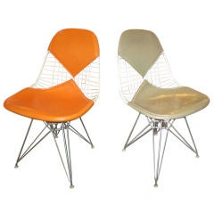 Two Charles Eames Wire Mesh Chairs on Eifel Tower Bases