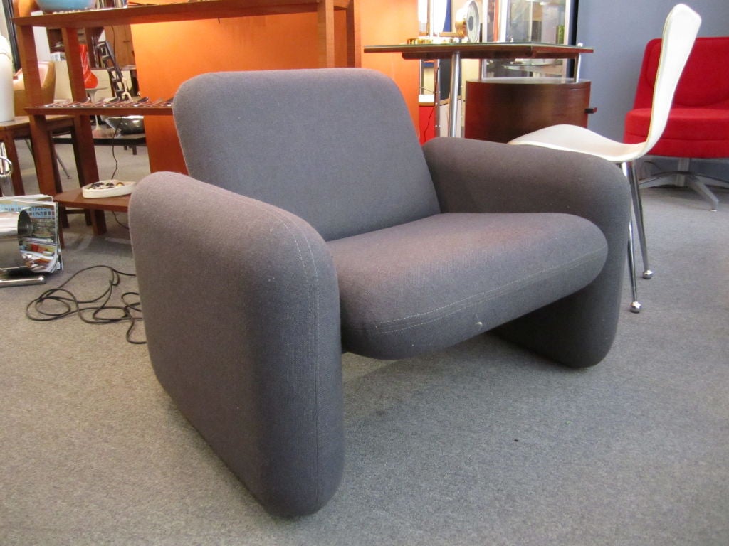 Steel framed and fully upholstered pillows in the shape of the iconic chicklet formed into chairs with original steel gray upholstery and original tags.  This particular set was bought in 1985 for a BMW showroom