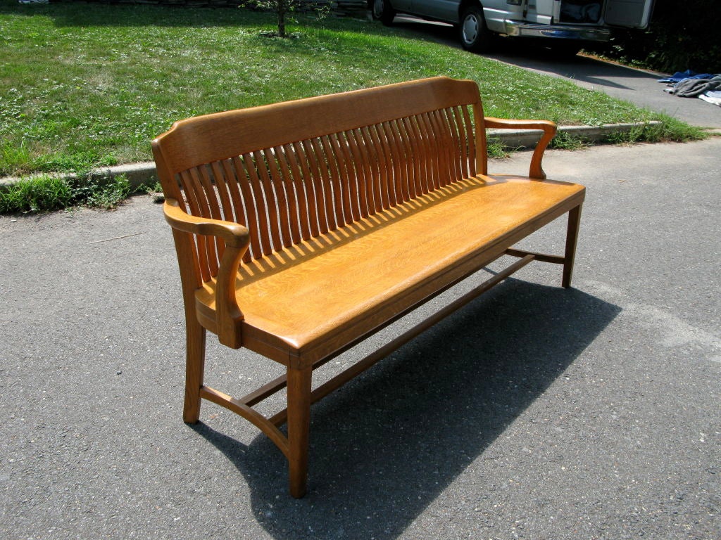 Solid Oak Bench from the 30's/ 40's.  You see lot's of chairs in this style, but uncommon to find the bench!  Maybe from a library or train station?!  Great condition and very solid!