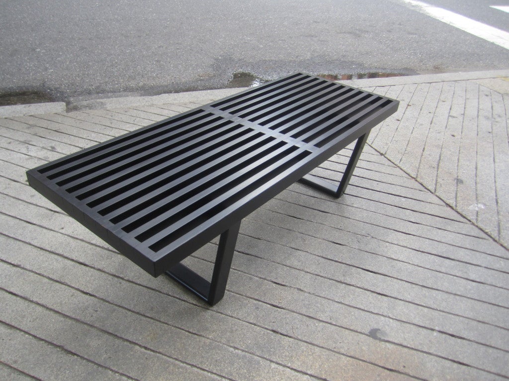 Iconic slat bench by George Nelson for Herman Miller 48 inches long.  This is an older edition with the slightly rounded leg supports