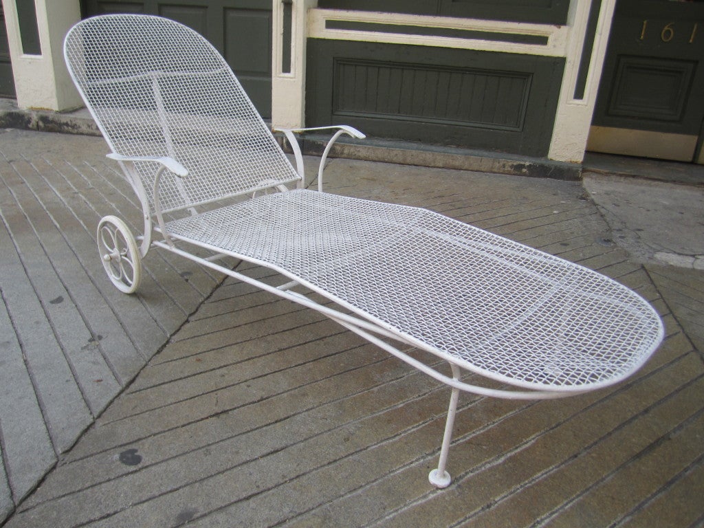 Wrought iron and steel mesh chaise with adjustable back rest and wheels