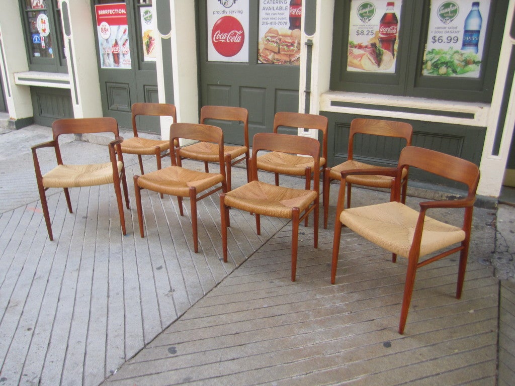 Set of six solid teak and rush seat dining chairs.  Original finish and rushing.