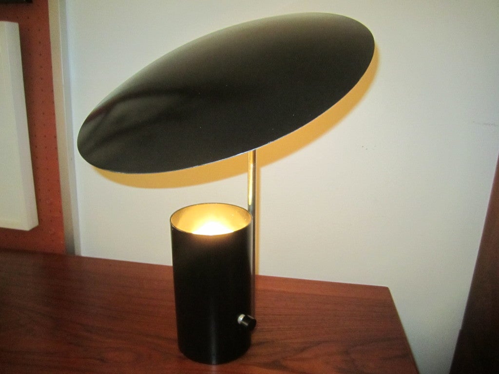 Pivoting George Nelson Table Lamp with two light intensity settings.  Black and Chrome Finish.