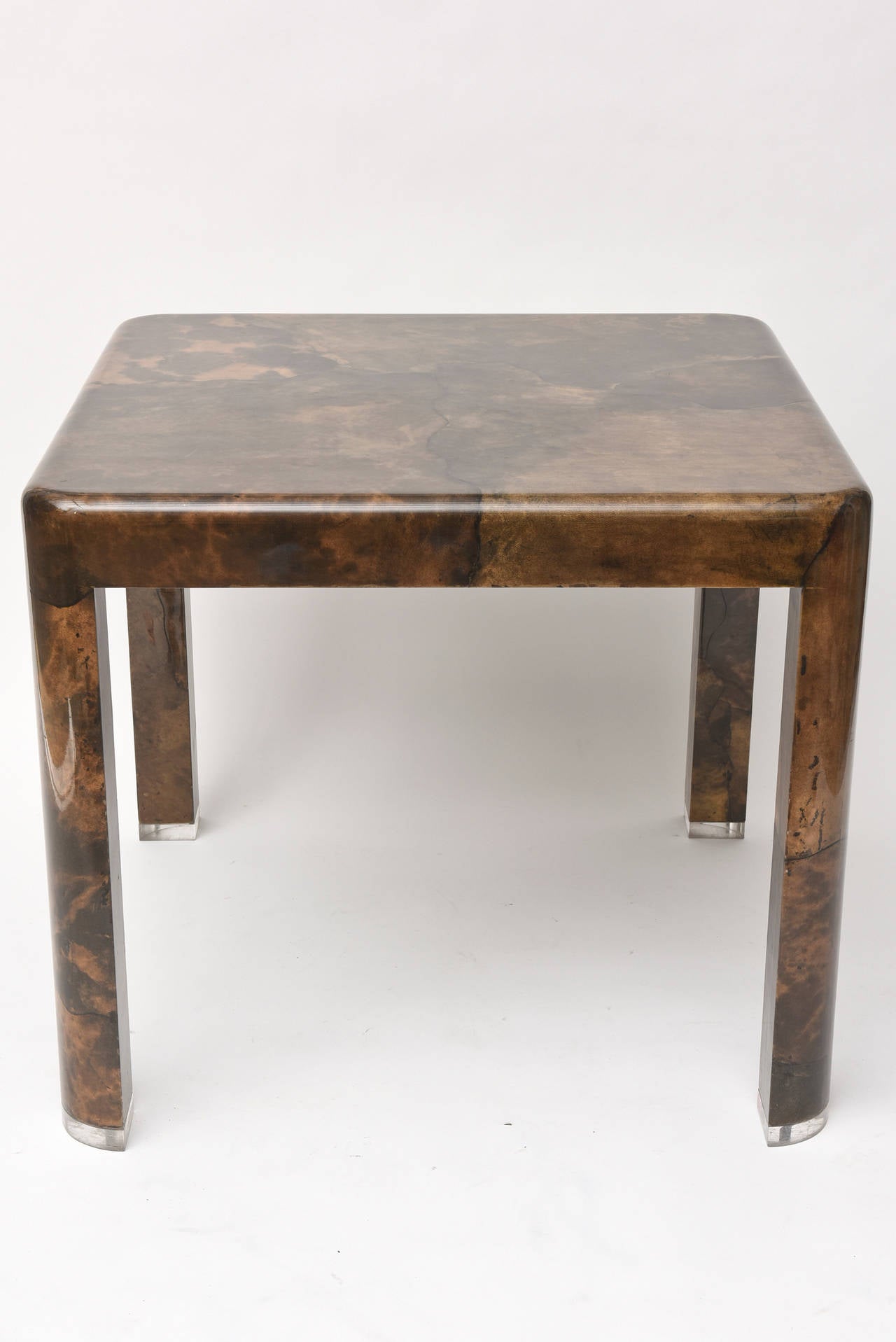 Beautiful brown dyed goatskin accented with Lucite.
Game or dinette table.