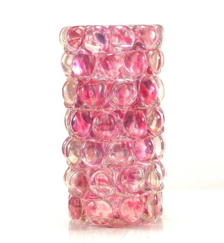 A beautiful example from the Lenti series in colorless and
partially melted pink glass.