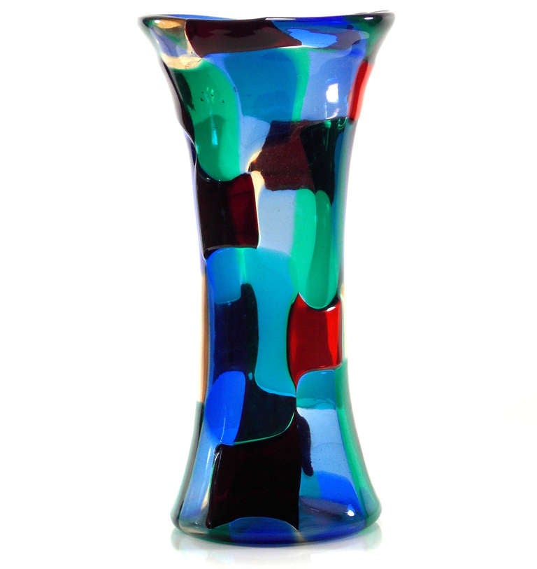 Fulvio Bianconi Pezzato Vase model #4338 as shown in the 
catolgo rosso,folio 111.
A beautiful example of the Parigi Variant,show casing red,blue straw and green tesserae.