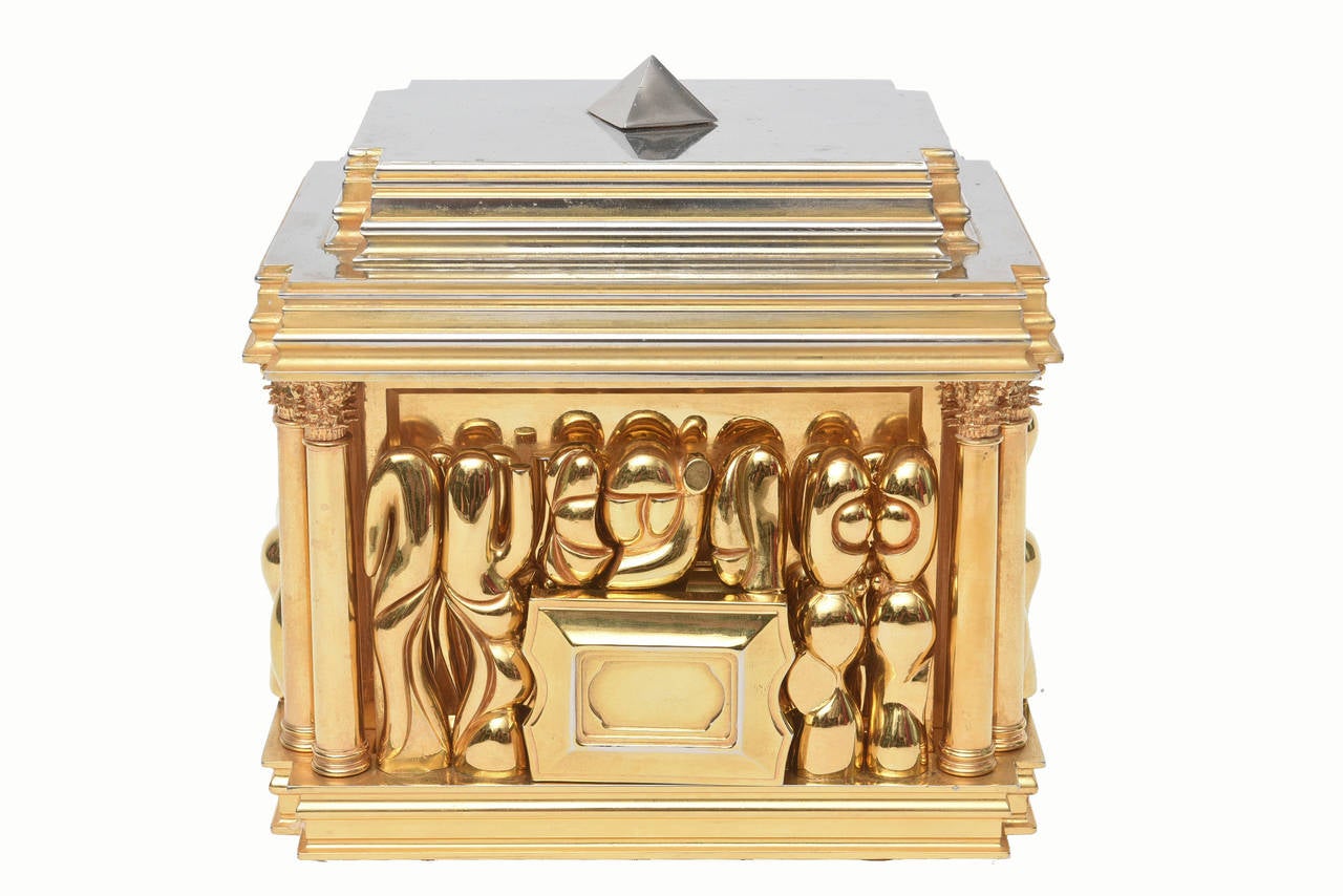 The gold-plated version of this sculpture.
The Box contains 88 parts which, consist of a magnificent place setting for two.
In addition there are four serving utensils, four goblets, four candlesticks, an ashtray and center piece.
There are also