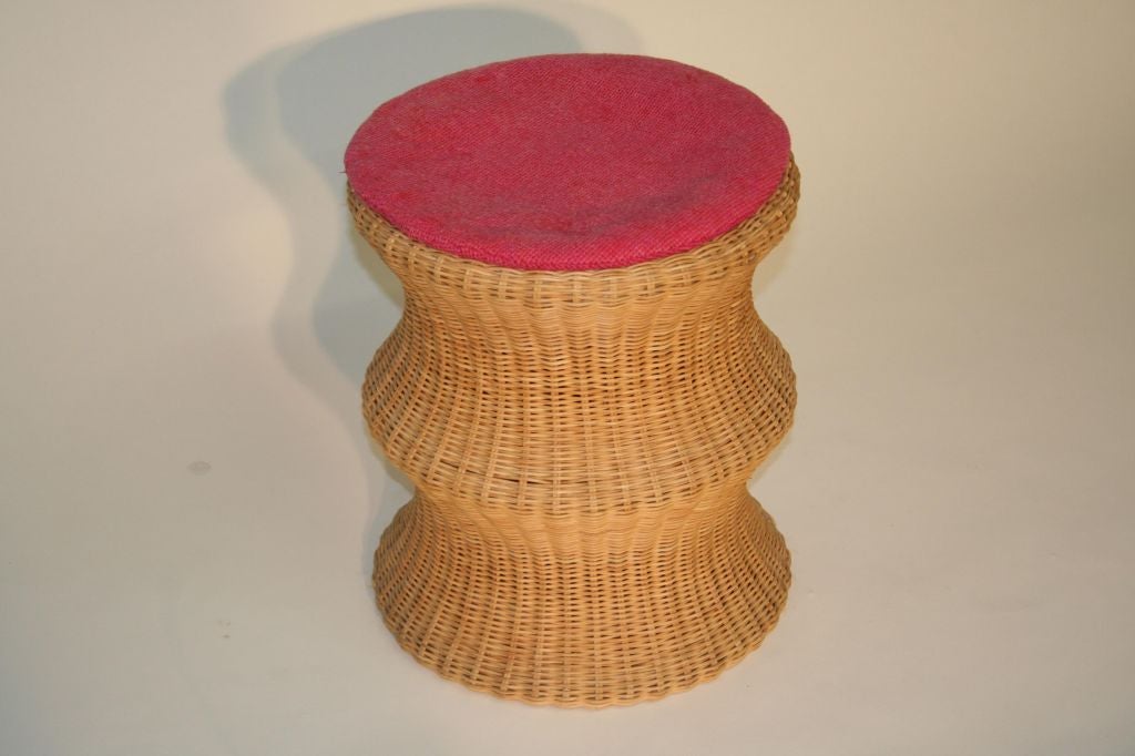 Eerrio Aarnio Woven Cane Stool

hour glass form with removable cushion,

Distributed by Stendig. Signed Stendig and Eerio Aarnio Label