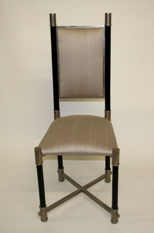 Set of Eight Dining Chairs designed by
Alntonio Pavia. Lacquered Wood and Steel.