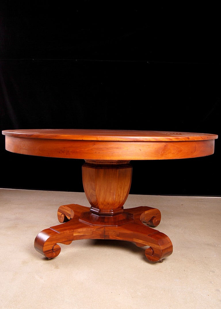 Beautiful mahogany pedestal table, classic American Empire style. 
Made by Brown and Simonds, Boston, Massachusetts. Elgin Simonds was previously a partner with Gustav Stickley until 1898. Table can accommodate up to four 20
