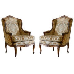 Pair of French Antique Walnut Louis XV-Style Winged Bergeres