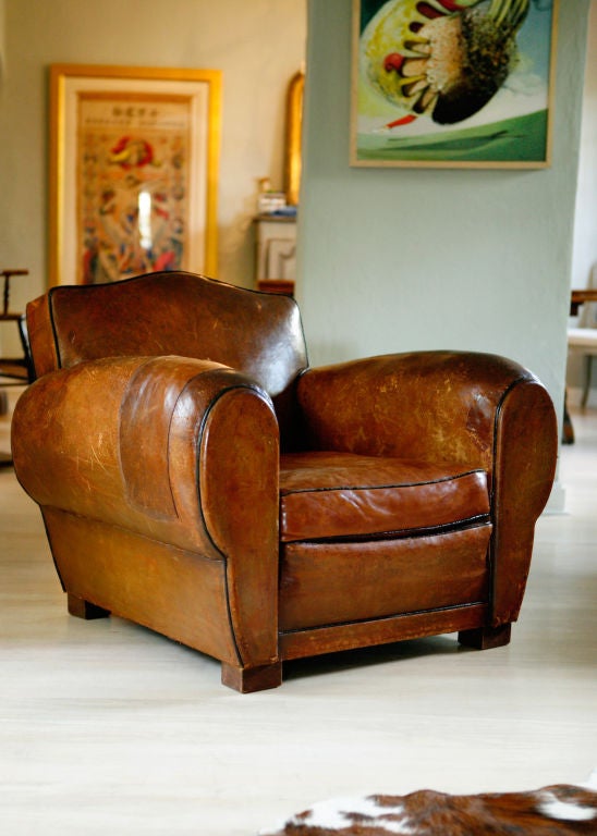 Great pair of French Art Deco Leather Club Chairs. Original leather is worn in and full of character.  Very comfortable. Patch on one arm.