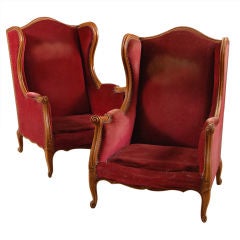 Pair of French Antique Walnut Louis XV style Winged Bergeres