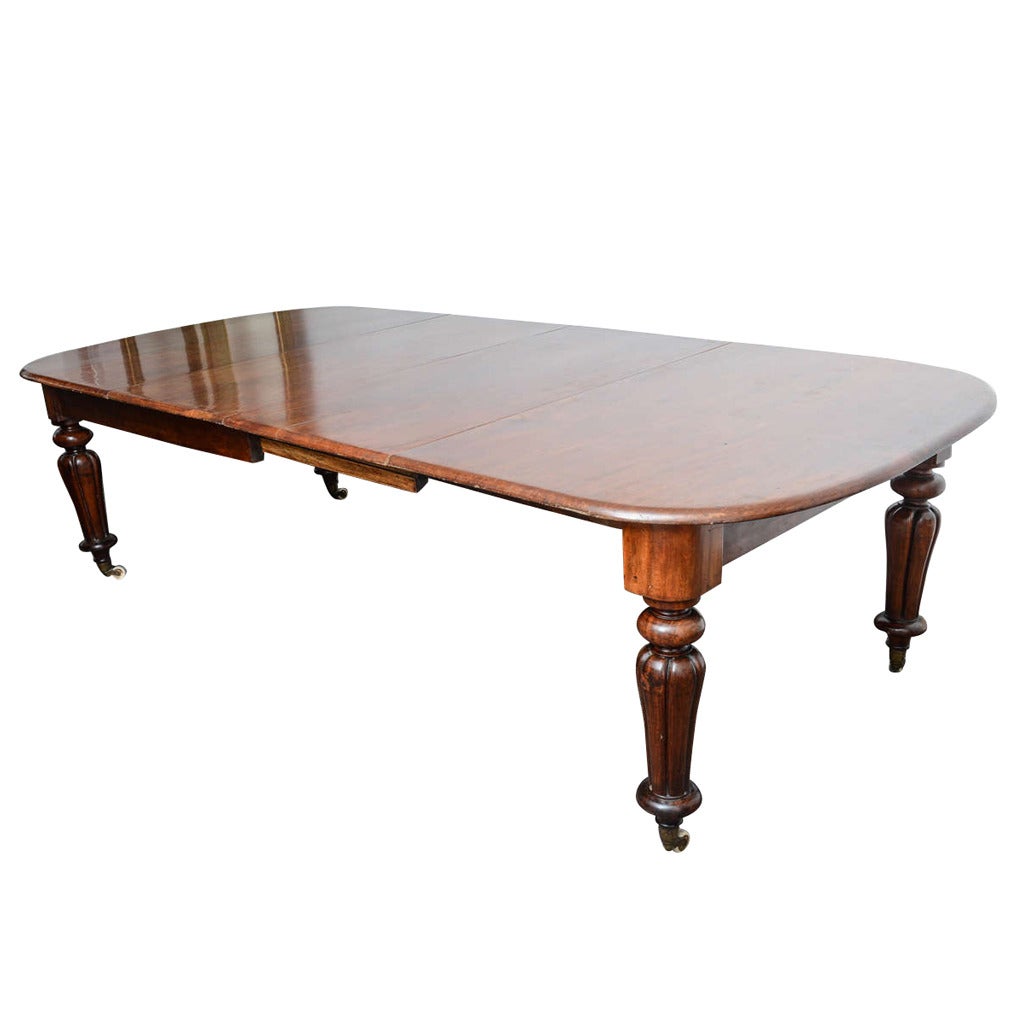 19th Century English Mahogany Dining Table with Two Leaves