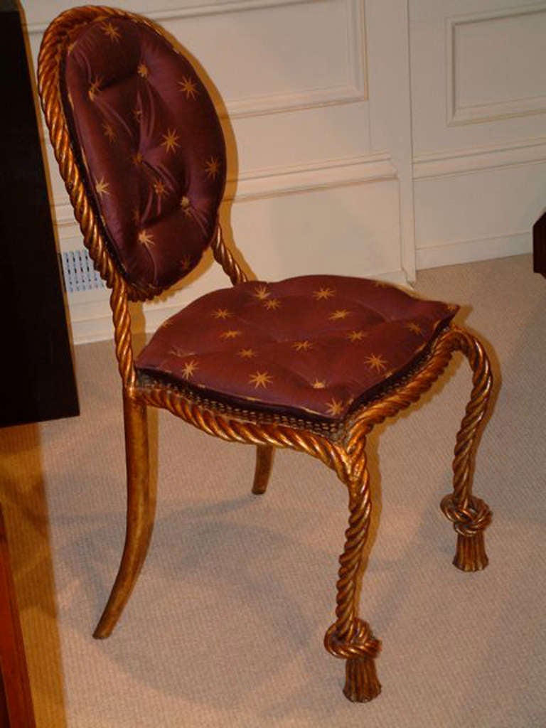 Pair of gilt iron side chairs, Italian, circa 1950. Hand-forged gilt iron in a heavy, twisted rope design.