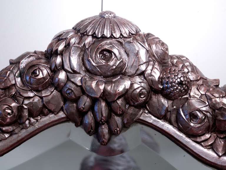 Attributed to Paul Follot. Silver leaf, copper clad, molded plaster mirror.