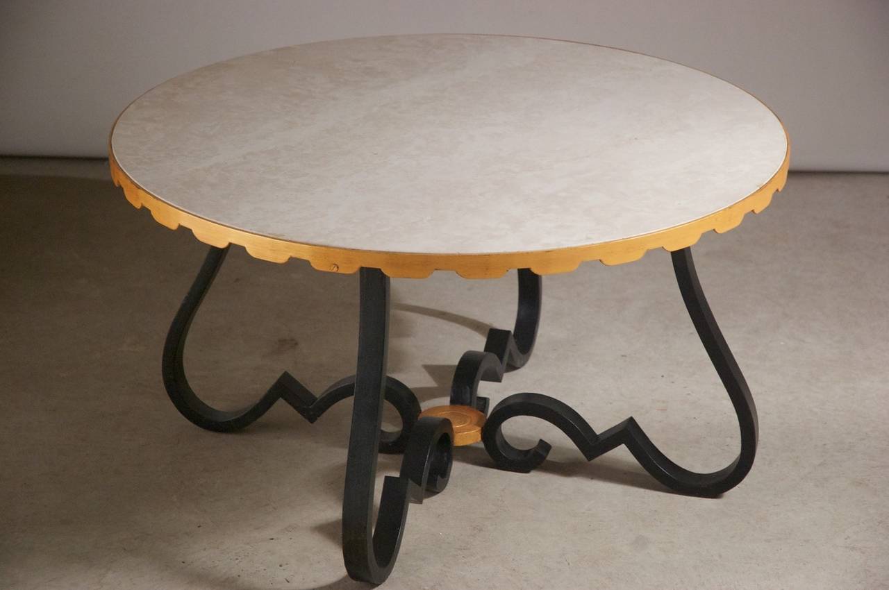French 1940s Art Deco coffee table in forged iron with gilt highlights and white marble top, circa 1945.
