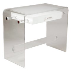 Clear, frosted and white lucite desk