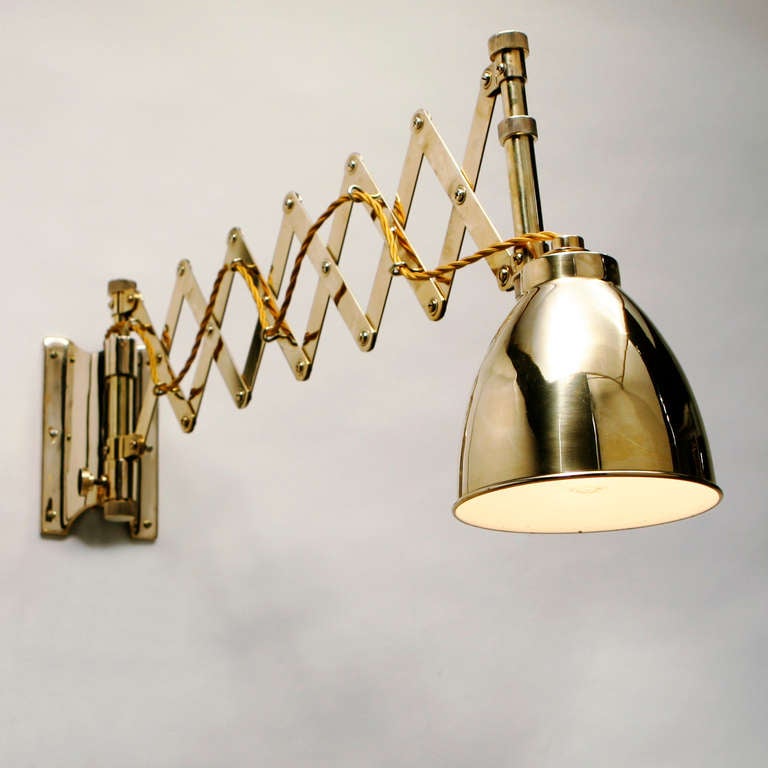 Brass admiralty pattern chart room lamp on extension rod. Vintage ship's style with brass shade. Extends from 14