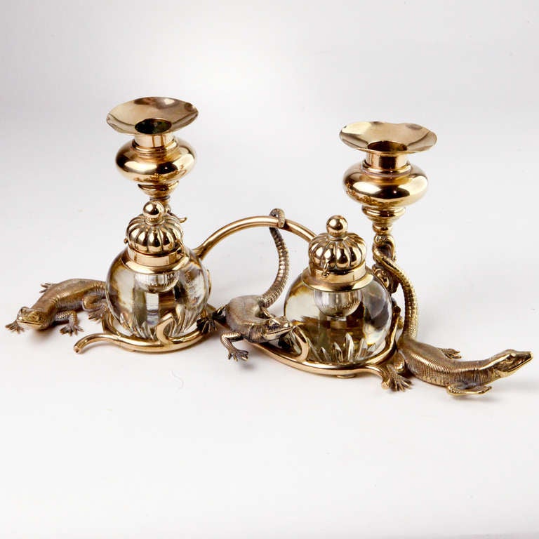 Finely detailed Victorian brass lizard desk set with inkwell and two matching candle holders. Three pieces - each amusingly designed with a coiled lizard as the base.