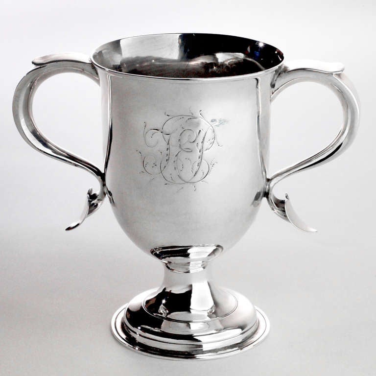 Rare 18th  century English sterling silver loving cup. Handles end in unique heart-shaped design. Engraved with traditional beautifully scrolled monograms on both sides. Hallmarked: George Smith & Thomas Hayter, London, 1792.