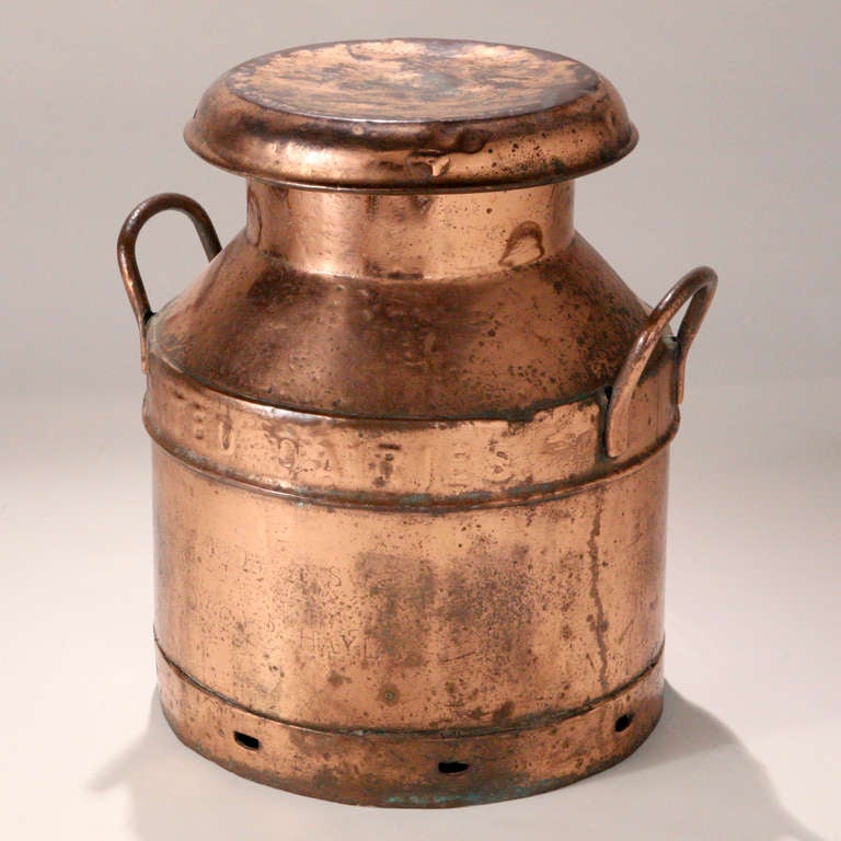 Large antique copper milk can with removable lid and side handles.  Circa 1885.