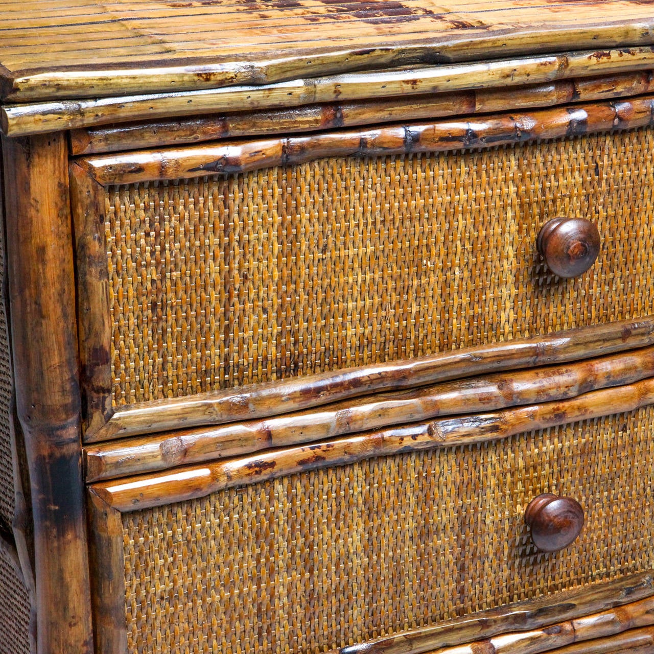Hard-to-find small three-drawer chest of drawers with bamboo and Rattan finish.