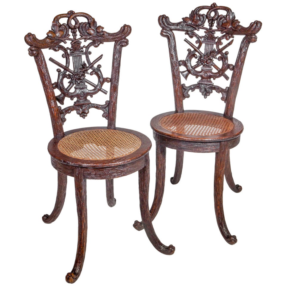 Pair of Black Forest Chairs For Sale