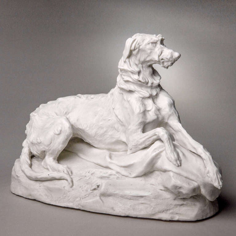 Parian ware tabletop dog sculpture of reclining Scottish deerhound. Marked: Copeland.