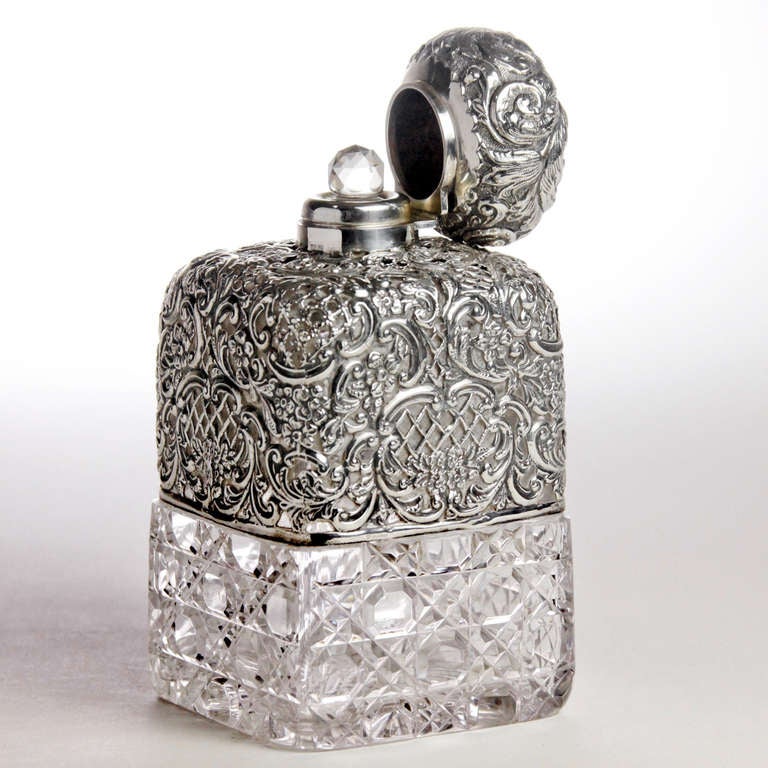 Edwardian Embossed Silver and Cut Crystal Decanter