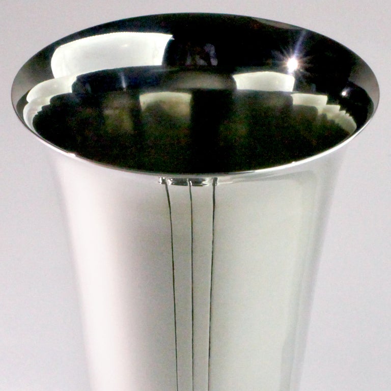 Striking sterling silver vase in Tiffany & Co's vintage century pattern. This vase dates to the 1940s and is marked with the letter "M" which stands for John C. Moore, Tiffany's president between 1907 and 1947. The stylistic elements