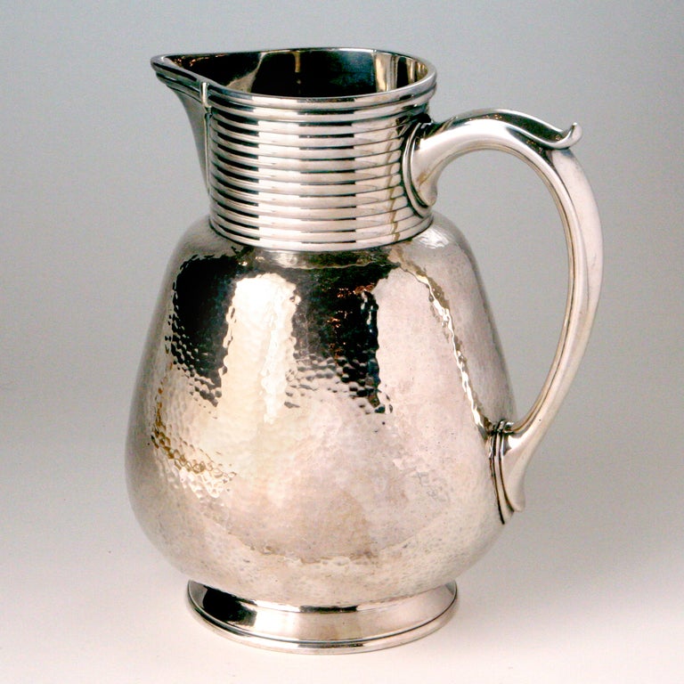 Beautiful signed Christofle silver plate water pitcher. Crafted by hand in its Haute Orfevrerie workshops in Normandie, France. Handmade and engraved and numbered (75) with authentic The Millennium HallmarK. Christofle pieces appear in museum