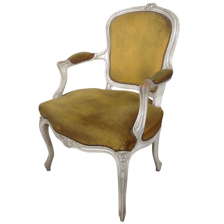 Exquisite Elegance: The Opulent Louis XV Armchair