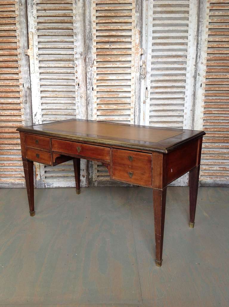 Very handsome French 19th century. Mahogany desk with original hardware and brass railing and detailing. This piece is sold in 