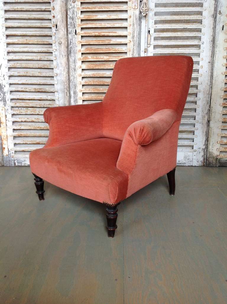 Late 19th C or Early 20th C French  armchair, upholstered in vintage salmon/coral velvet.

THIS CHAIR IS NOT FOR SALE, IT IS FOR RENTAL ONLY.