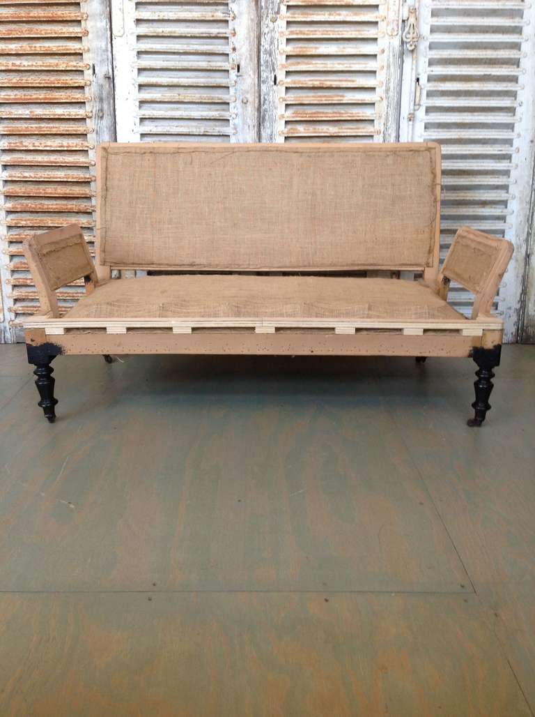 French 19th century sofa with separate square arms. This piece has been re-glued, retied springs and webbing is in burlap with the legs polished. Price includes  upholstery in Customer's Own Fabric.