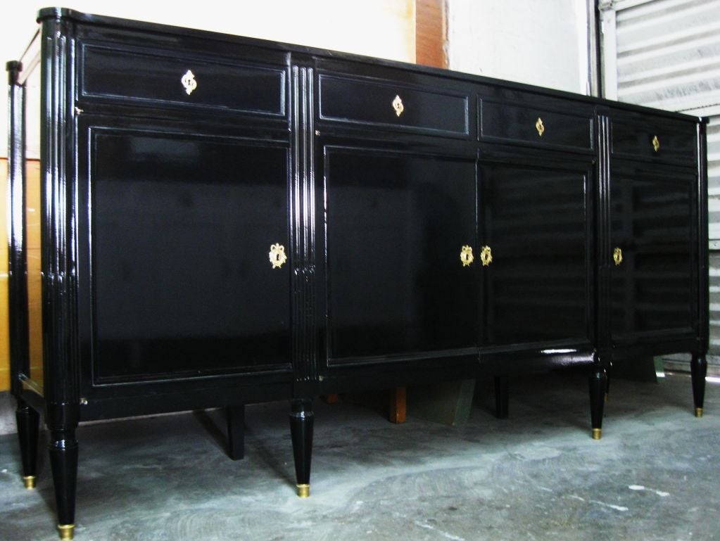 Superb French LXVI Style, Jansen Sideboard, lacquered in a high gloss black with elegant #LXVI hardware, classical legs and form. Fabulously decorative, wonderful option as console, buffet, credenza in a living , dining even bedroom. Great storage.