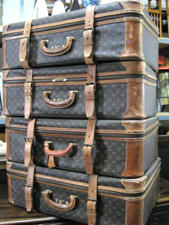 Late 20th Century Set of 4 vintage Lousi Vuitton Suitcases / luggage