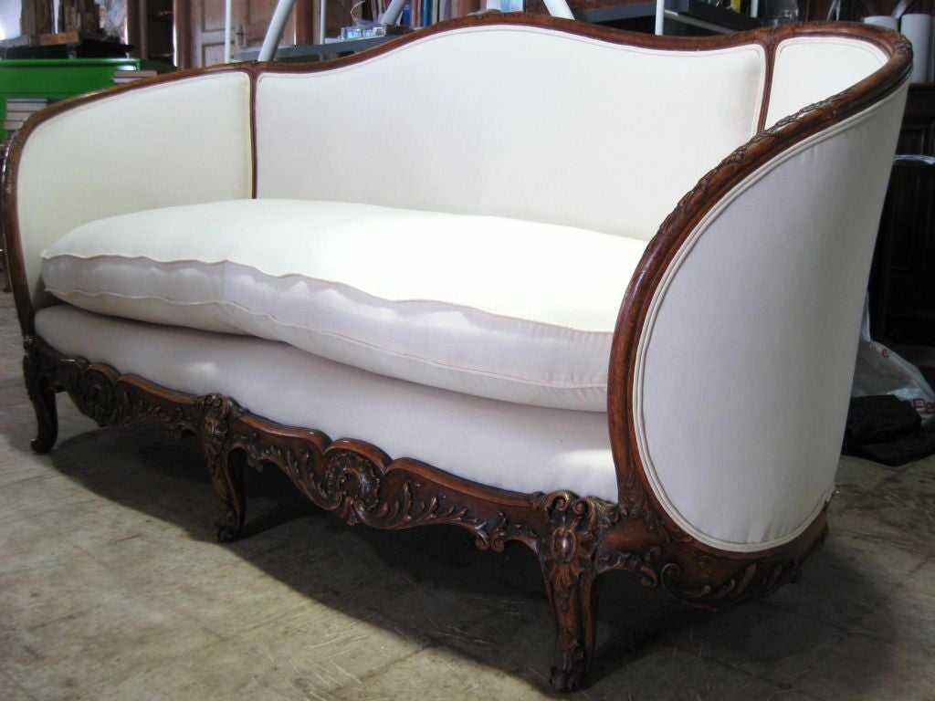 #Exceptional #LXV inspired 19th Century #Sofa / #Banquette / canape with surperb curved form and deep rich bold carved frame. Also available the matching pair of bergeres. #Elegant #French #cabriole legs all around.