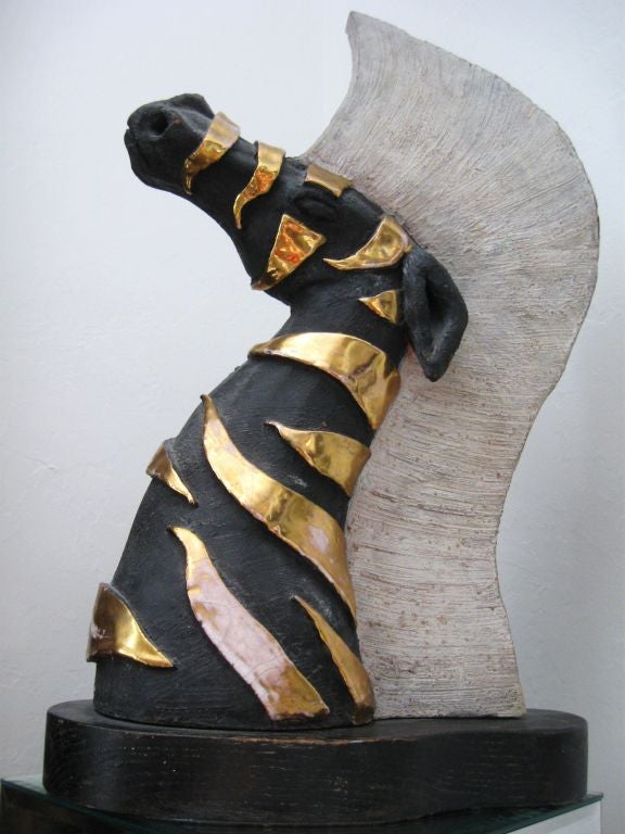 Superb Large Italian Terracotta Zebra head sculpture on wood base. Exceptionally decorative, bold lines, with orignal finish.